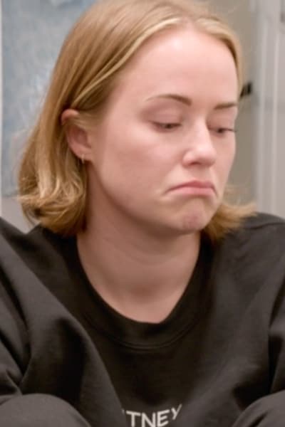 A person frowns